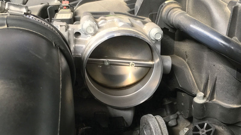 How do you clean the throttle body